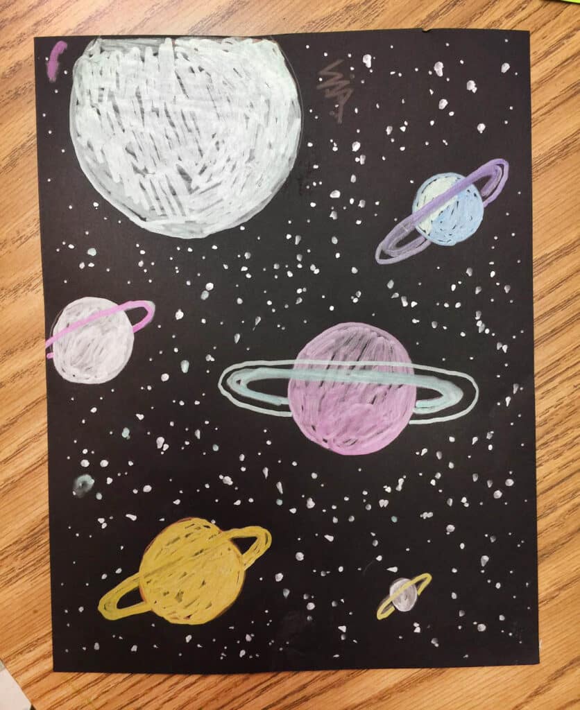 A drawing of planets by a student, made with the help of a step by step tutorial