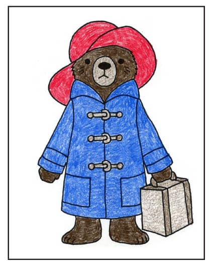 Final step of drawing Paddington Bear, tracing with a marker and adding color.